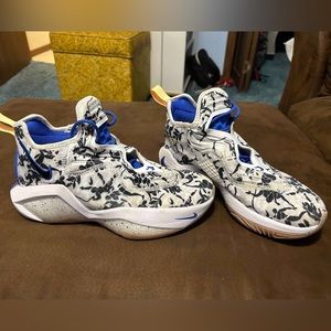 Blue black and white Nike basketball shoes size 8